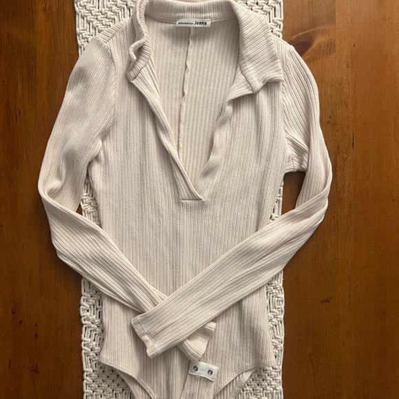 Reformation Tops - Reformation Cream Ribbed Long Sleeve bodysuit